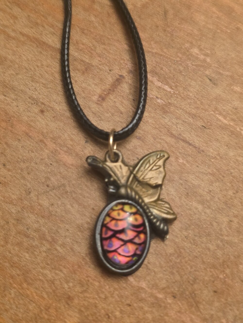 Orange Resin Butterfly Pendant With Colorful Cabochon On Black Cord Necklace